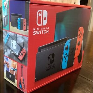 Nintendo Switch Neon Blue + Neon Red Joy-Con (New in Box).